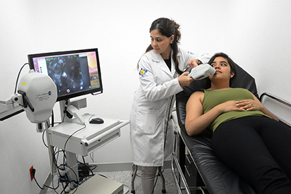 Student doing an ultrasound